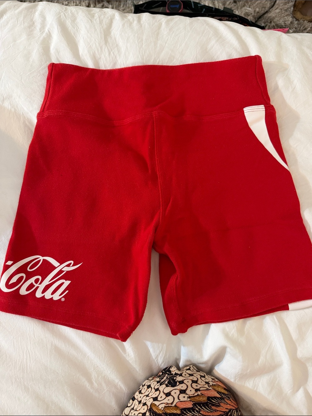 Kith Red Bike Shorts with White Coca Cola Logo